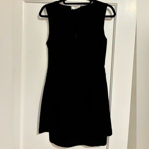 ALC Black dress with back cutout, front and side zippers and pockets